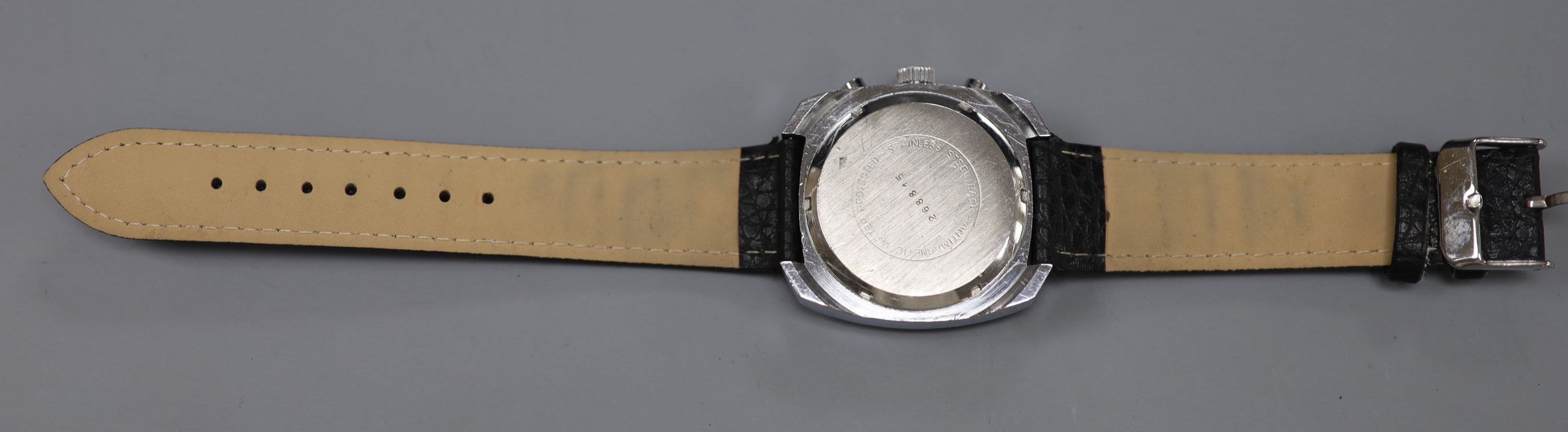 A gentlemans 1970s stainless steel Mondaine chronograph blue dial manual wind wrist watch, in later leather strap.